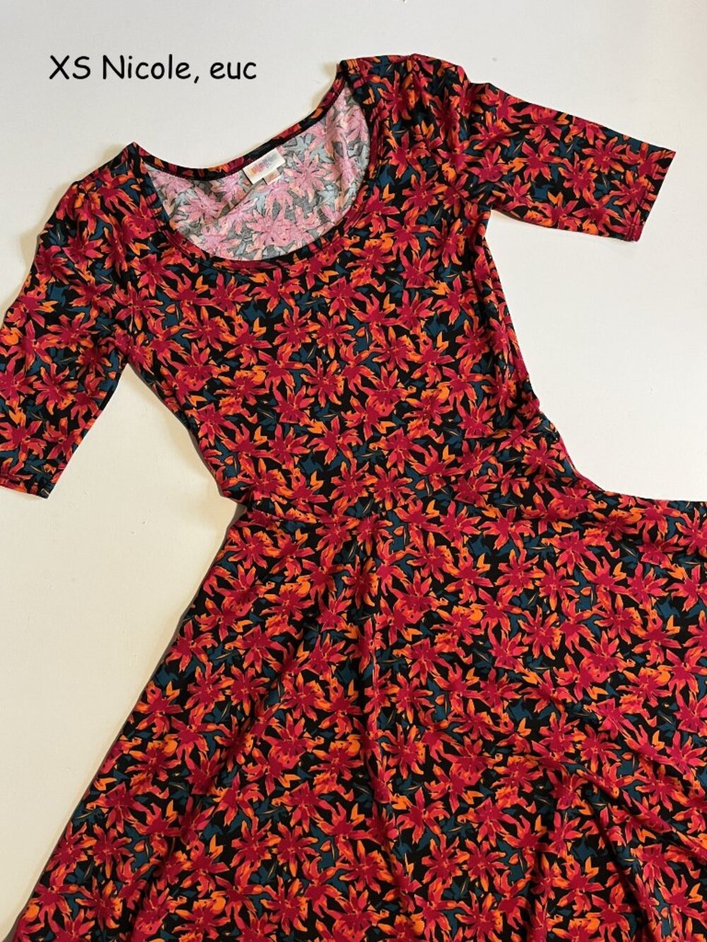 XS Lularoe Nicole fit and flare, black with red orange flowers, blue leaves